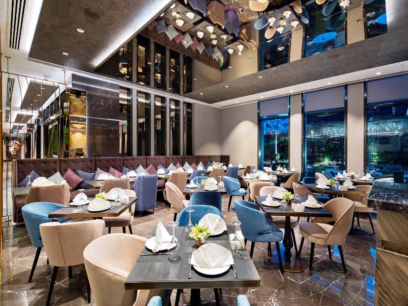 Hotel Doubletree By Hilton Istanbul - Piyalepasa Extérieur photo The interior of the restaurant